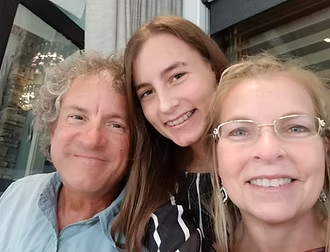 Captain Brian with his wife Eydie and daughter Clarissa